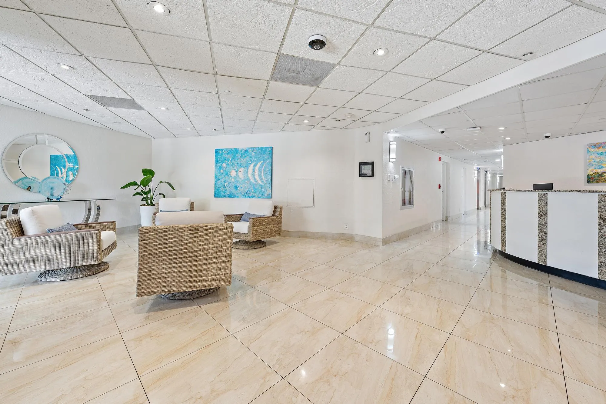 Lobby with a front desk attendant