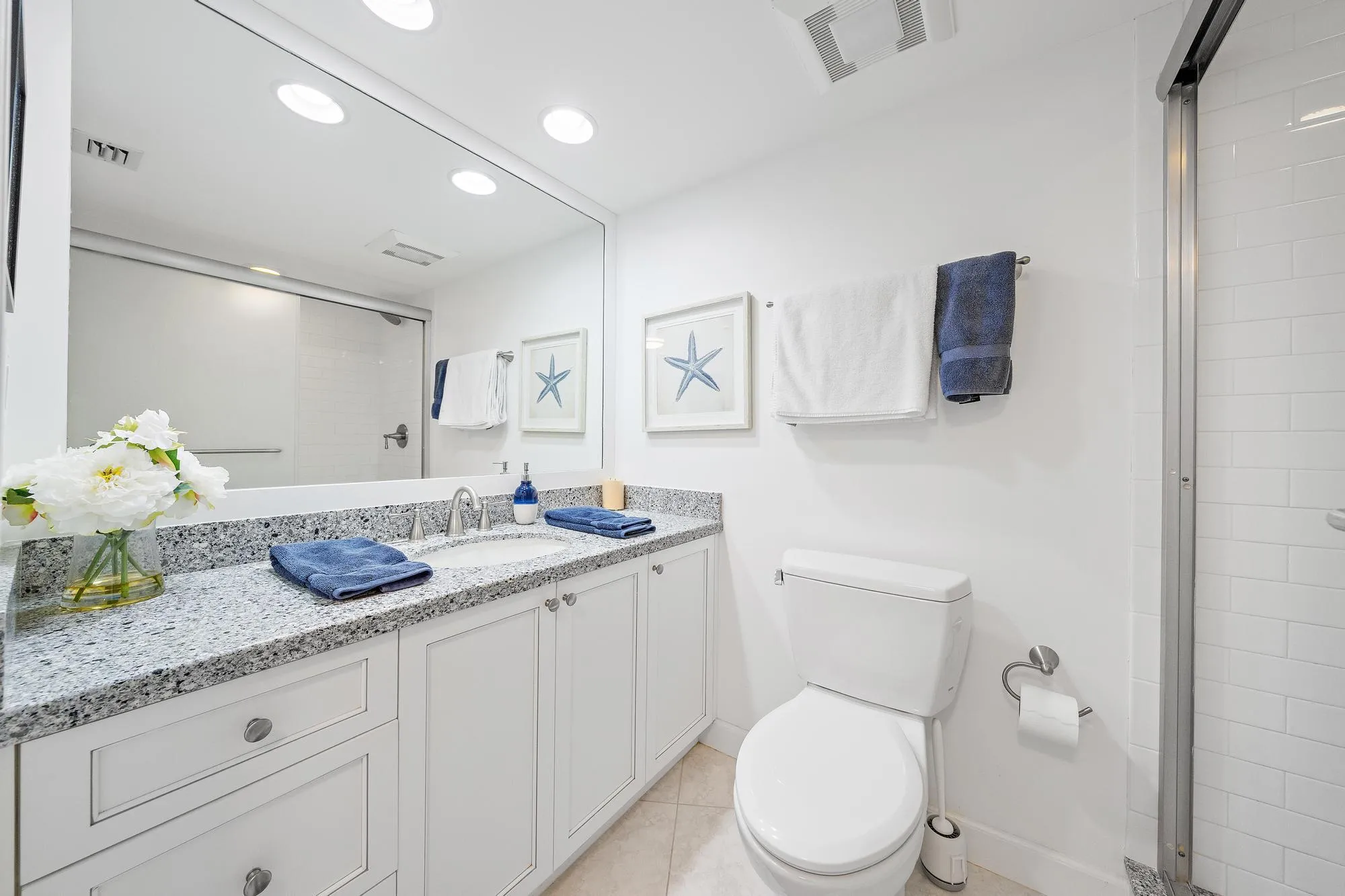 Updated bathroom with a walk-in shower.