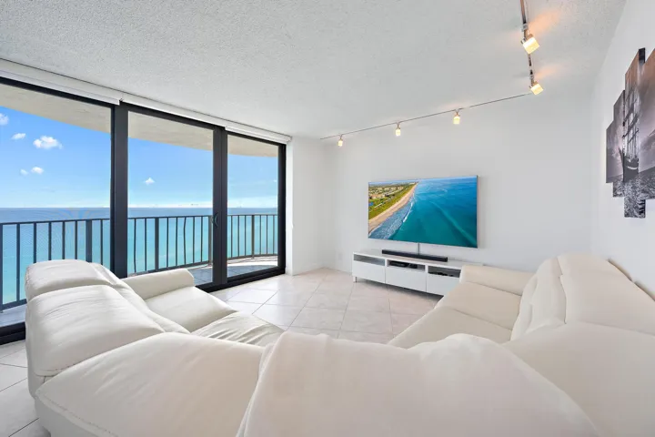 Enjoy watching TV and seeing the boats go by from your living room.