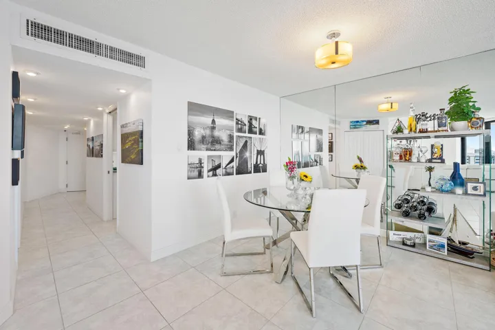 Located near the kitchen and sitting area.