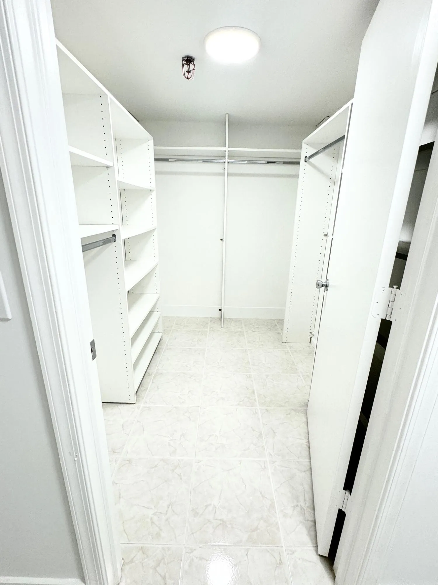 PRIMARY BEDROOM LARGE SPACIOUS WALK IN CLOSET