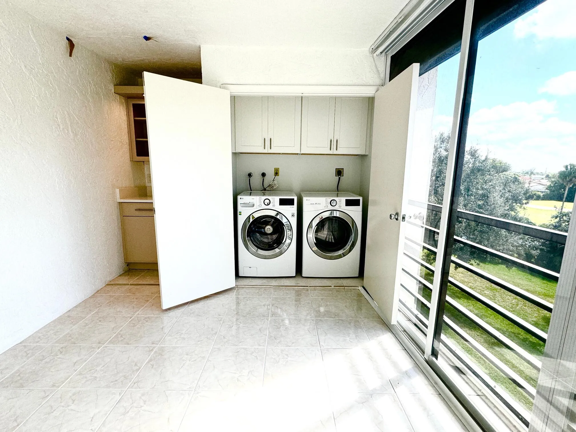PATIO AREA & IN UNIT LAUNDRY ROOM