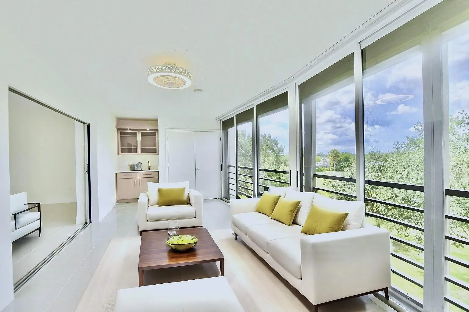 CONVERTIBLE PATIO AREA CAN BE OPEN AIR OR CLOSED FOR EXTRA LIVING SPACE! GORGEOUS VIEWS!