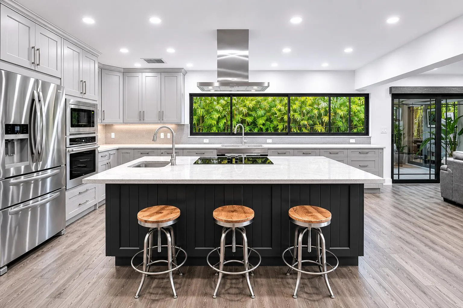 Virtually reimagined kitchen with lighter cabinetry & larger window.