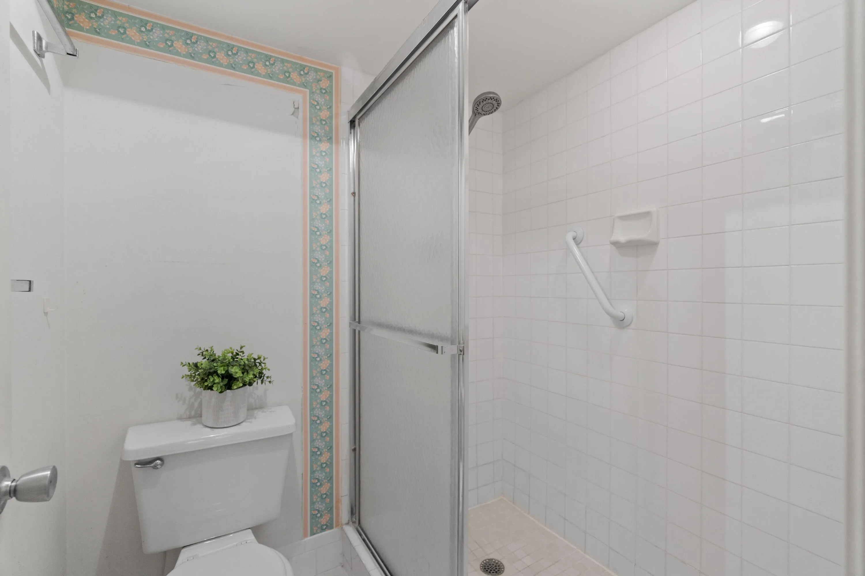 Enjoy tranquil garden surroundings with mature trees and landscaped green space.