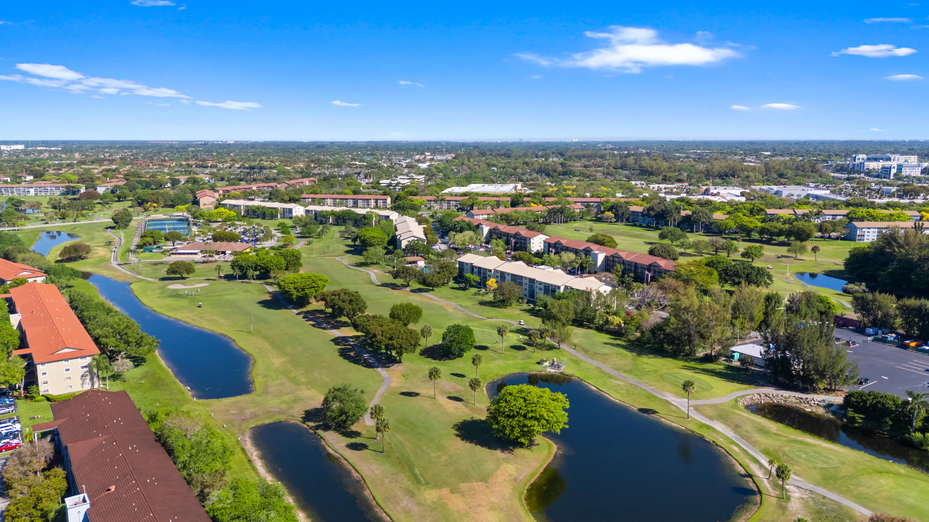Beautifully maintained grounds with scenic lakes and golf course views woven throughout the community.