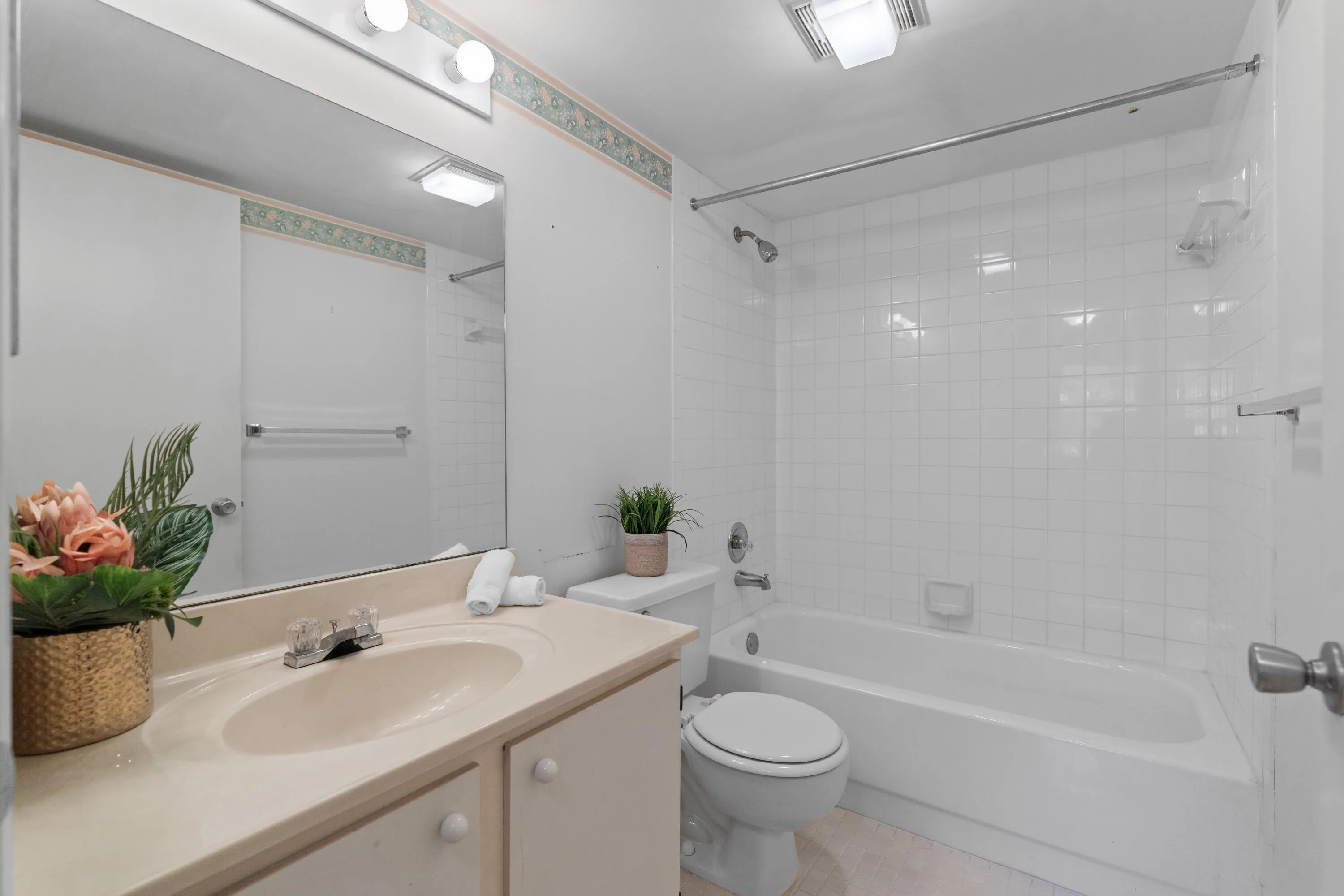 Clean and functional bathroom with a full tub and shower combination.