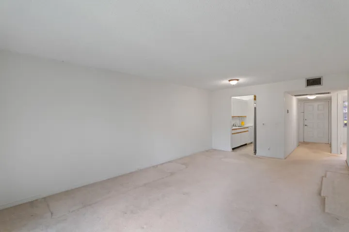 Spacious living and dining area with an open layout, offering flexibility for comfortable everyday living and entertaining.