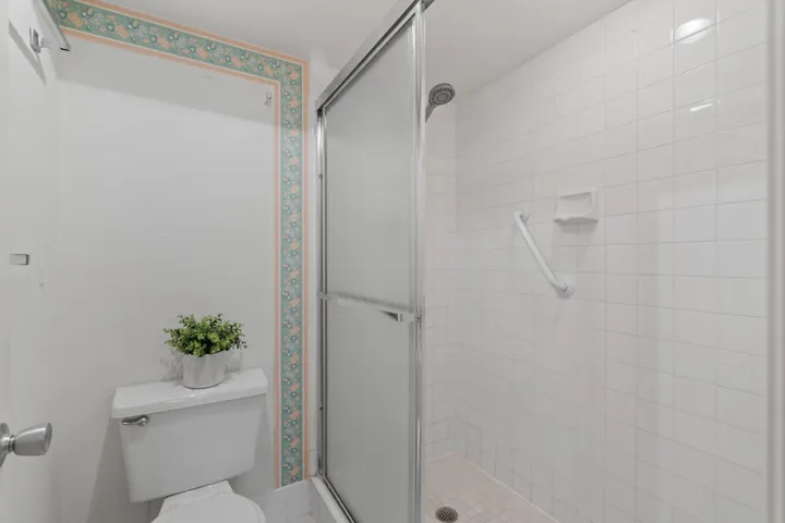 Enjoy tranquil garden surroundings with mature trees and landscaped green space.