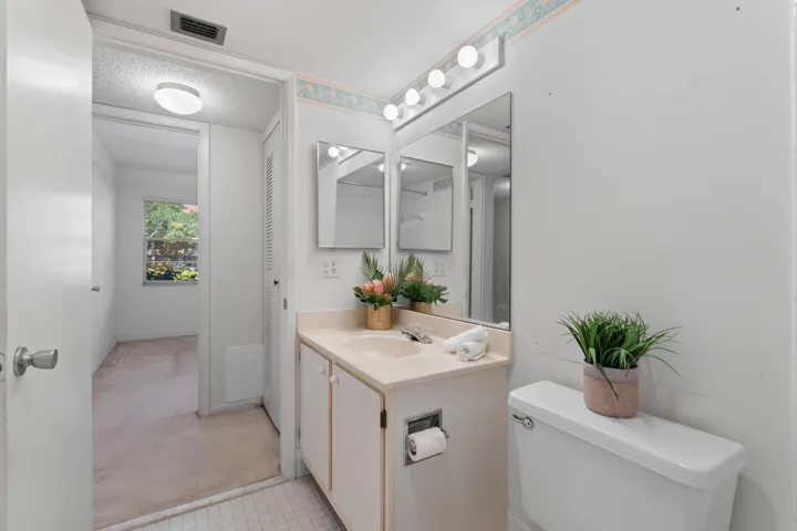 Spacious vanity with ample counter space and storage for everyday use.