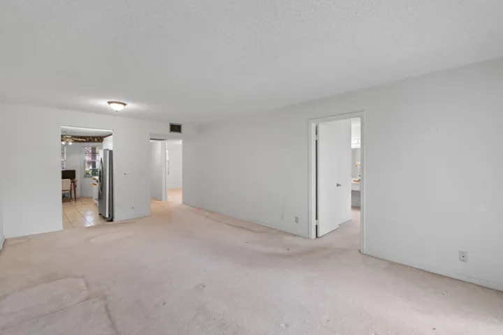 Thoughtfully designed 2-bedroom layout with spacious living areas, split bedrooms, and an enclosed patio for added living space.