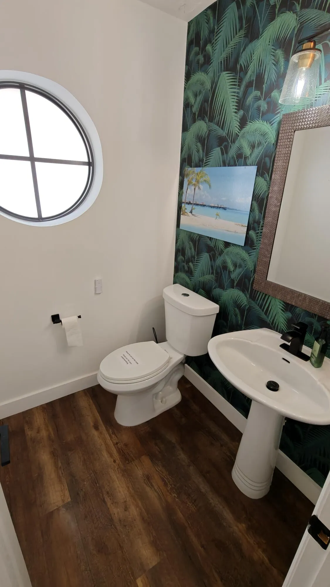 Half bathroom near entrance off livingroom