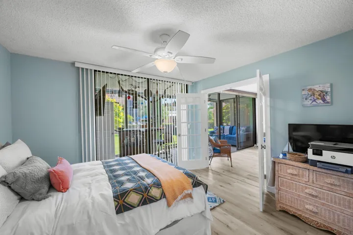 Guest bedroom opens to Florida Room.