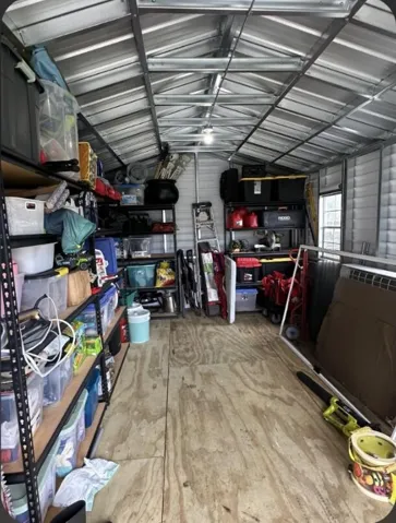 INSIDE OF SHED. HAS ELECTRIC CONNECTED.