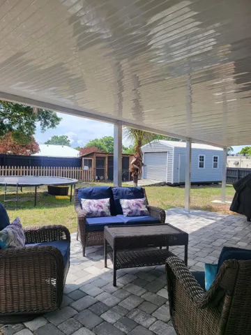 LARGE COVERED PATIO AREA BACKYARD