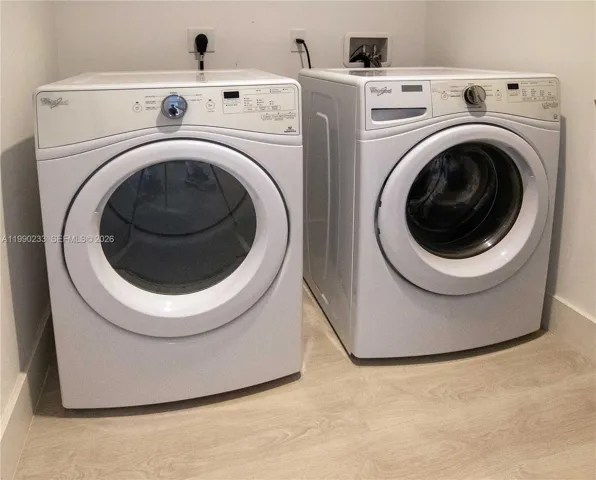 Washer and Dryer next the kitchen