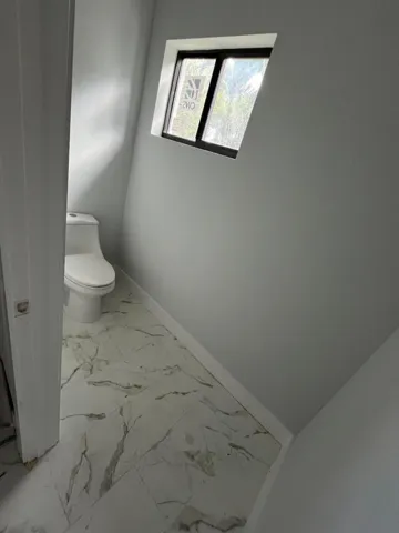master toilet with pocket door
