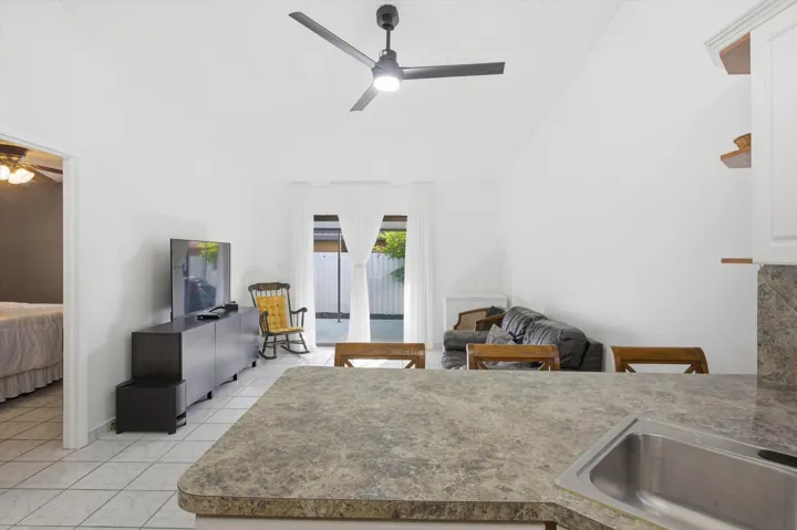 Step inside to bright, open living areas with abundant natural light, complemented by a practical kitchen and well-sized bedrooms.