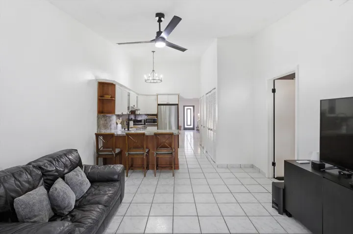 Step inside to bright, open living areas with abundant natural light, complemented by a practical kitchen and well-sized bedrooms.