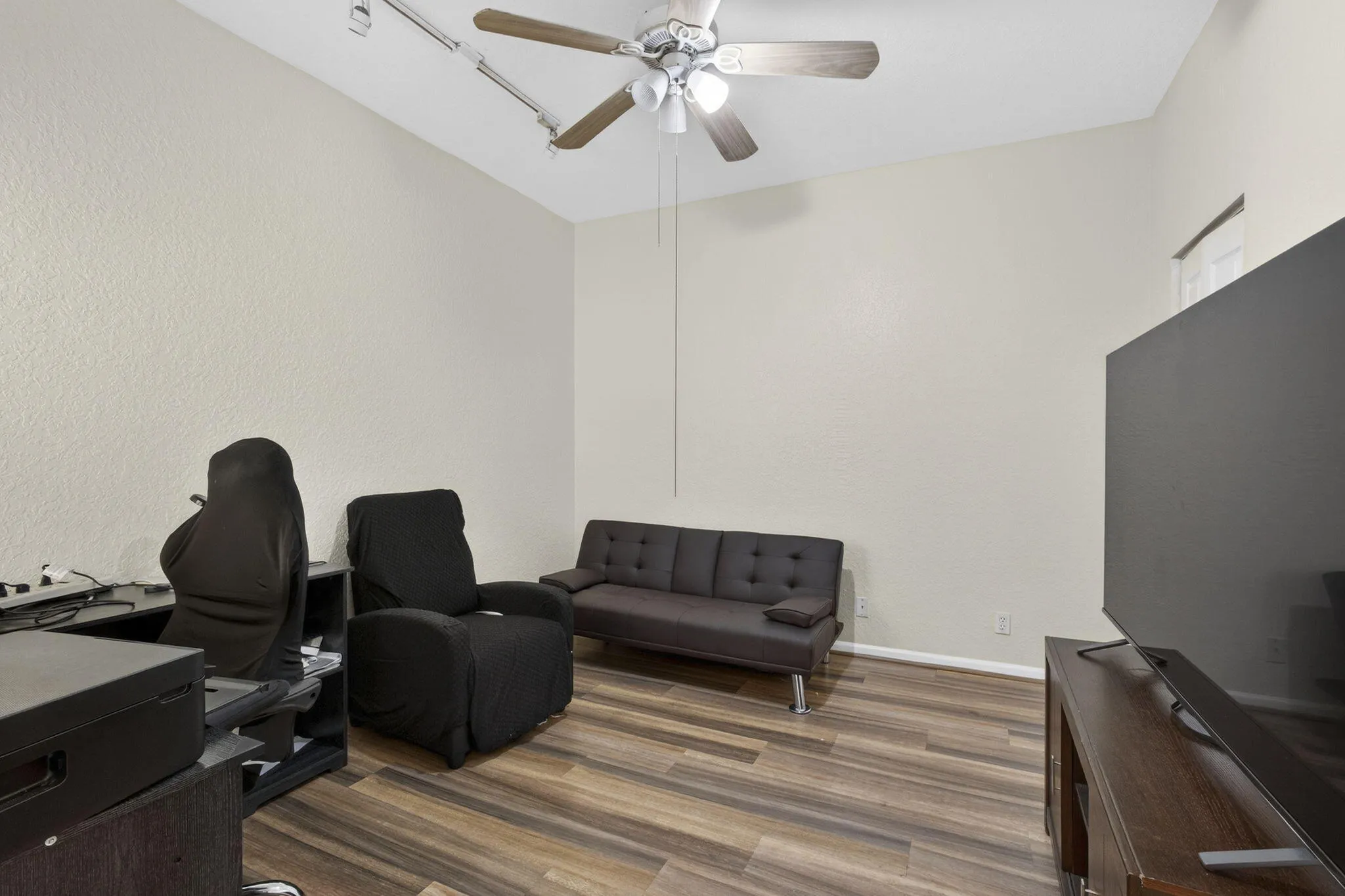 DR w tray ceiling, currently used as extension of Family Room
