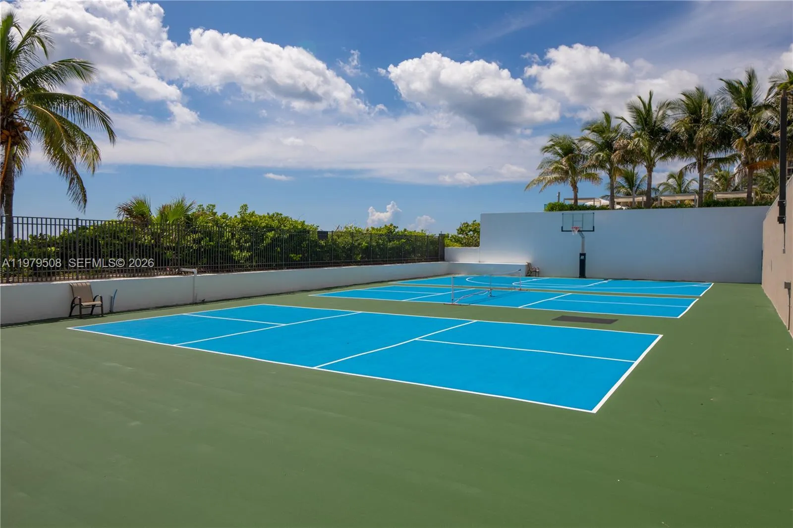 outdoor rec area pickle ball courts and a basketball court at the pool deck beach area WOW