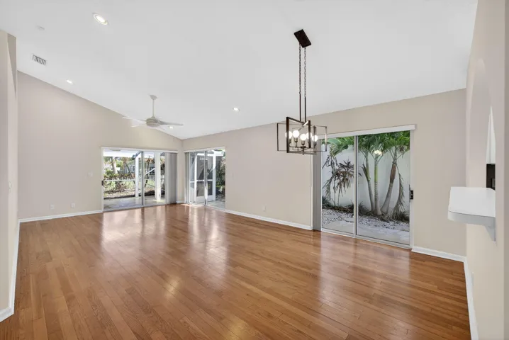 Open space with six sliding glass doors and natural lighting