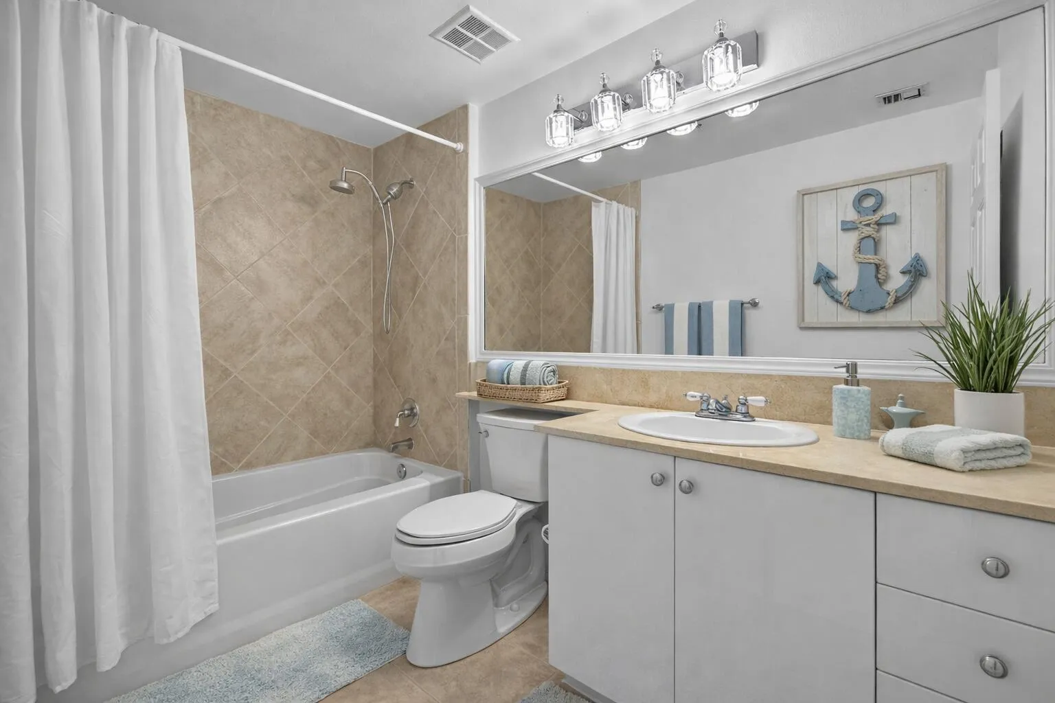 Coastal bathroom with nautical decor gue