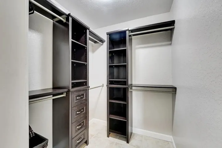 Walk-in Master Closet with Built In Cabi