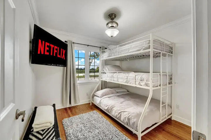 Guest Bedroom with Tripple Bunk Beds. Tw
