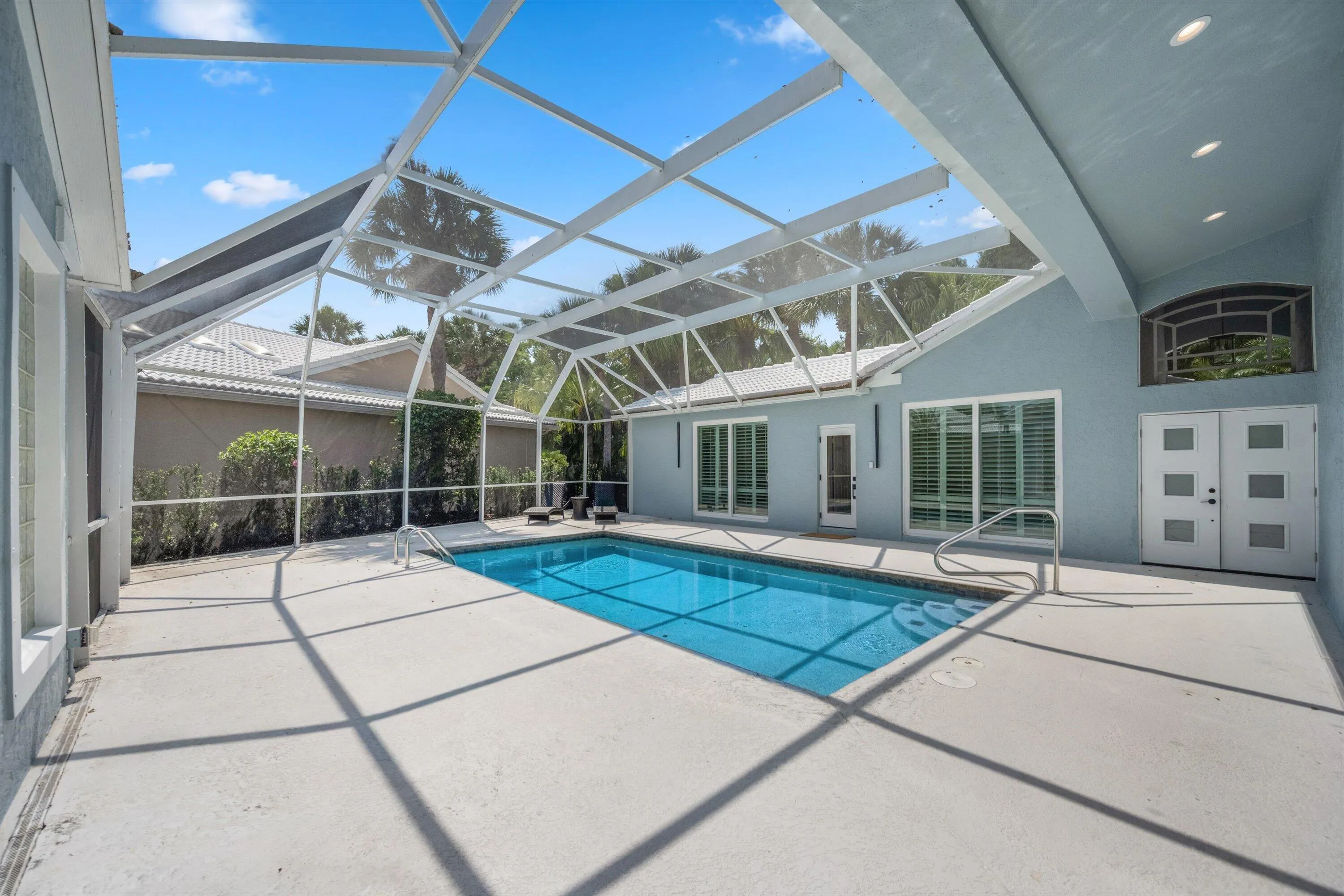 SCREENED POOL AREA/ ENTRY TO GUESTHOUSE