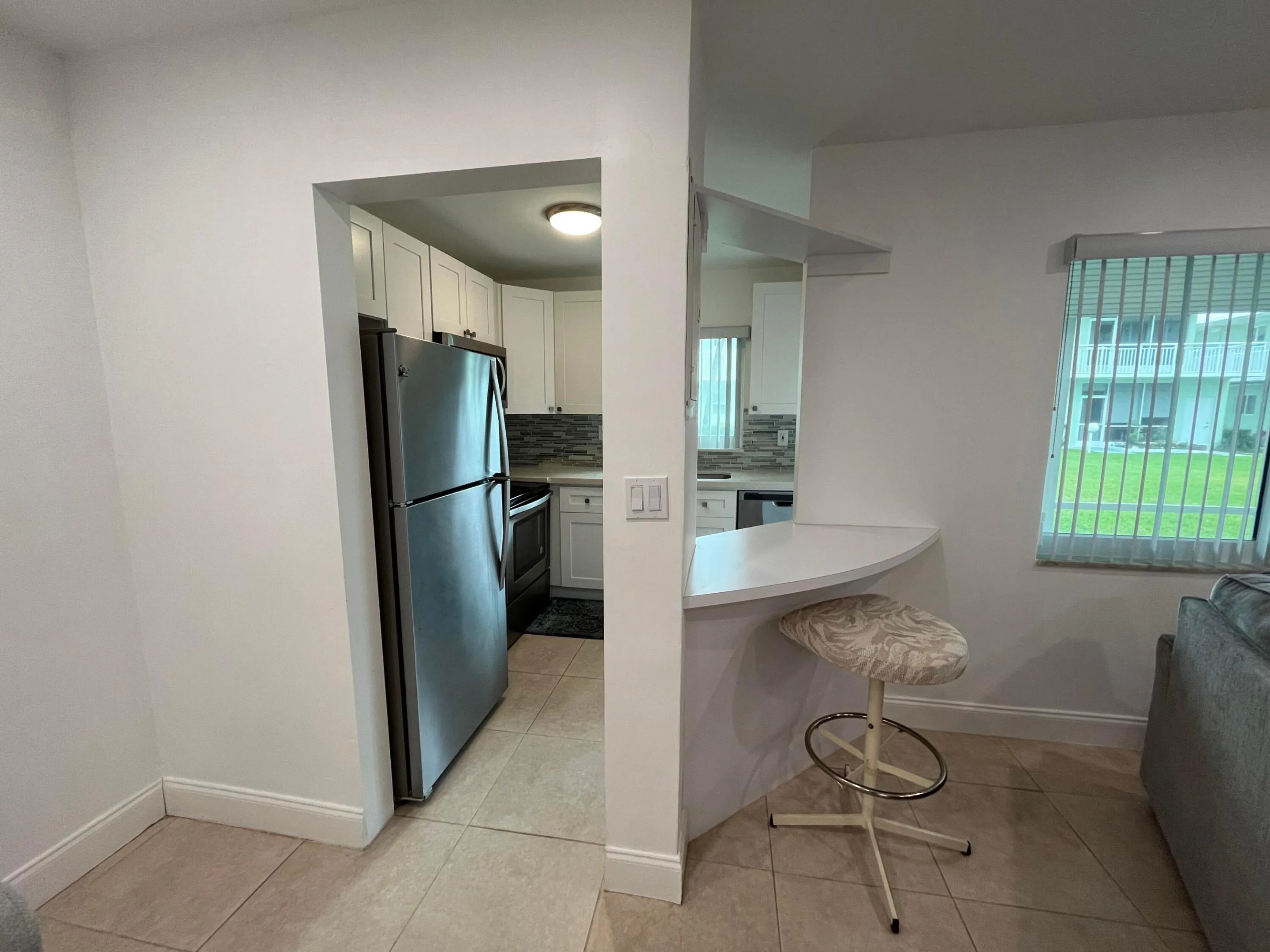 Open kitchen with pass through and snack bar