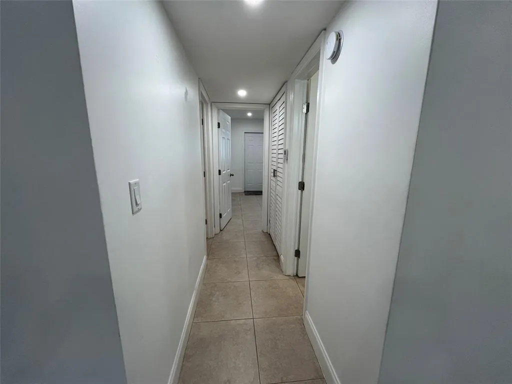 Hallway leading to the primary and second bedrooms