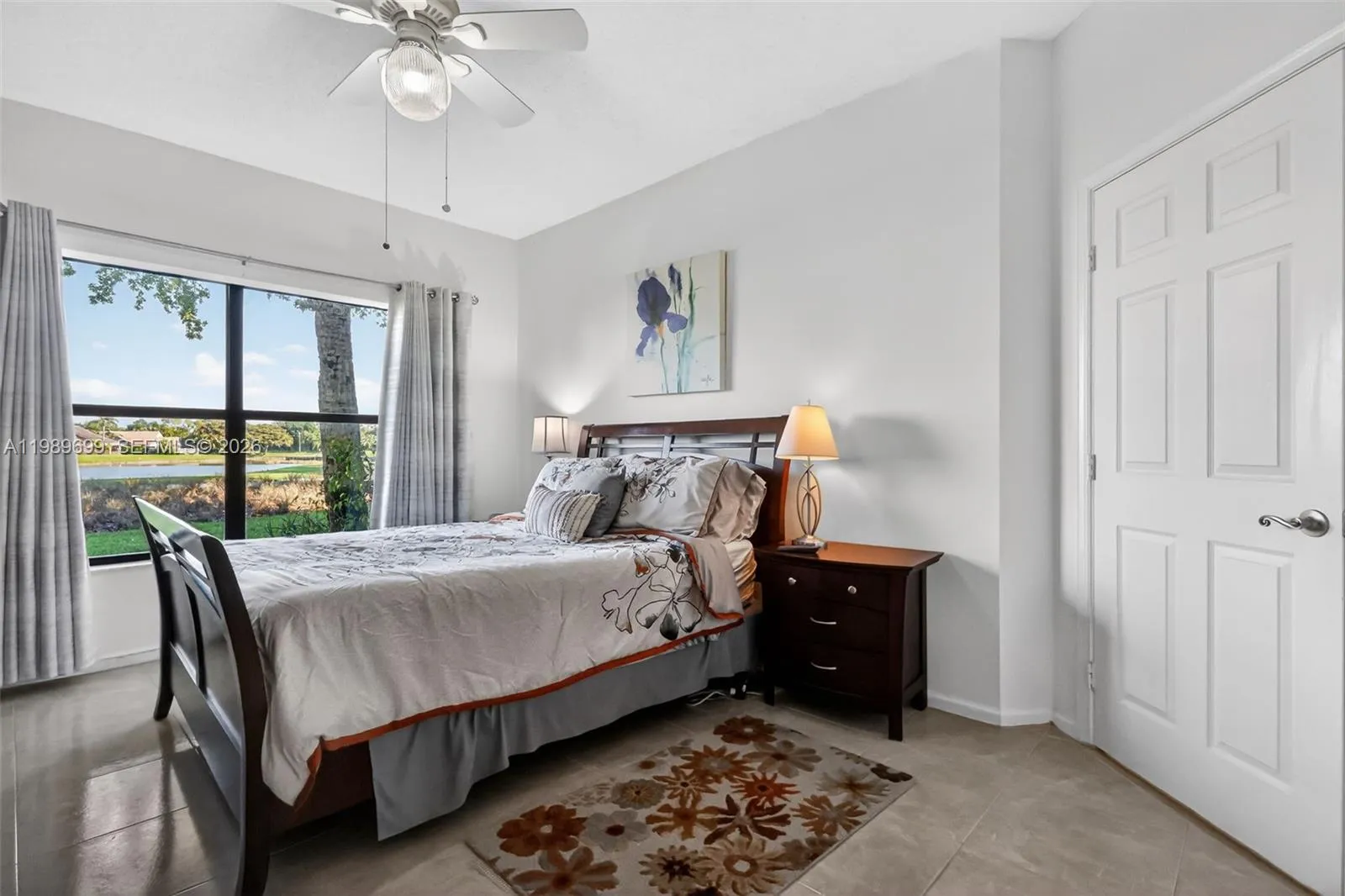 The primary suite offers a large walk-in closet and picturesque views