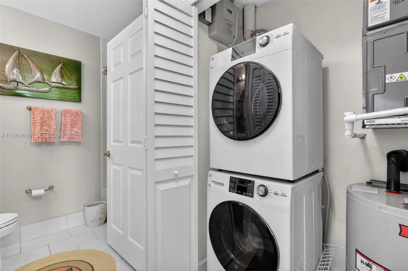 Recent updates include a brand new A/C, hot water heater, and stacked washer and dryer.