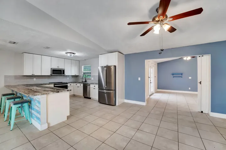 Kitchen with pool view.