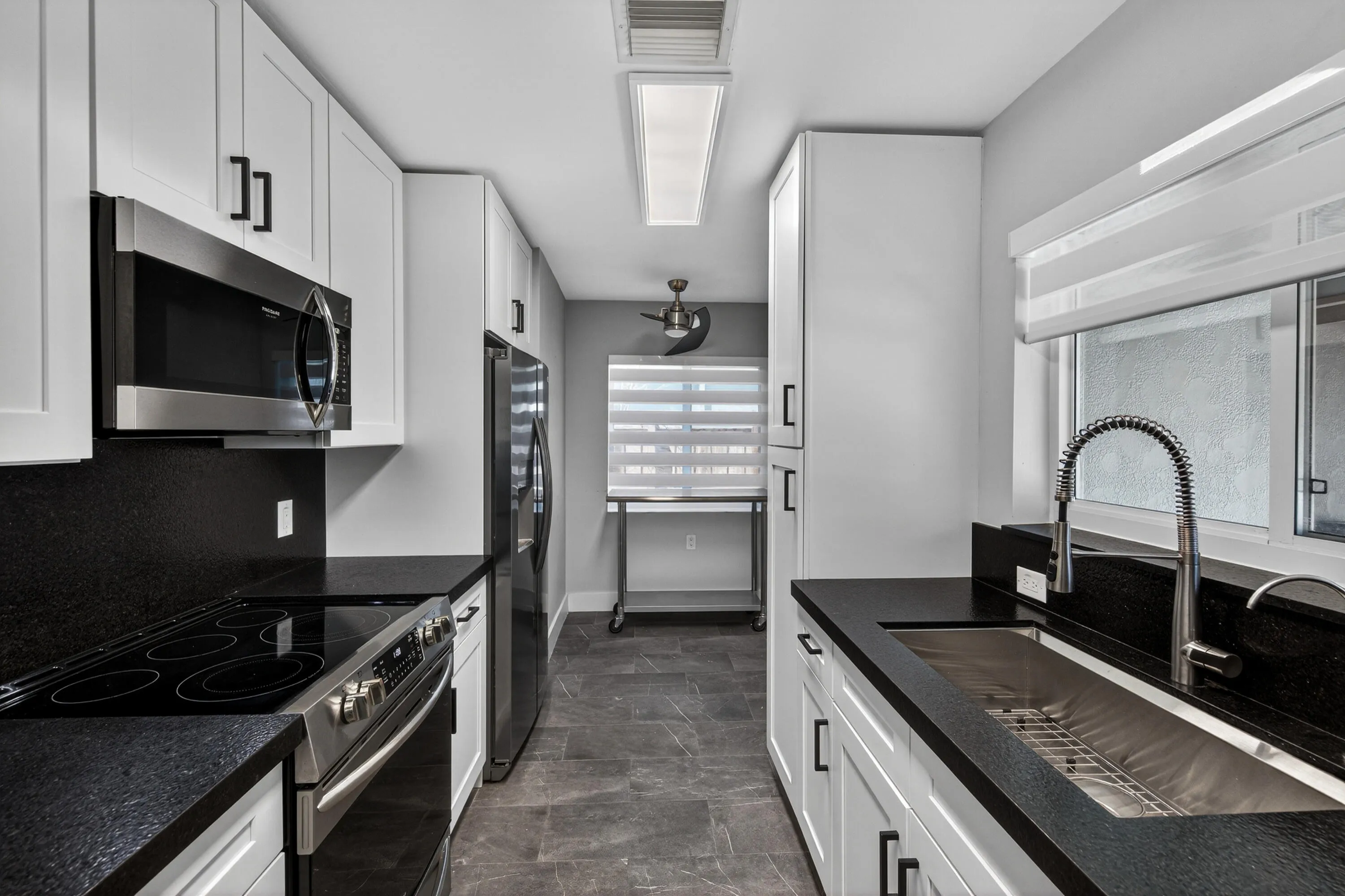 Kitchen features large pantry.