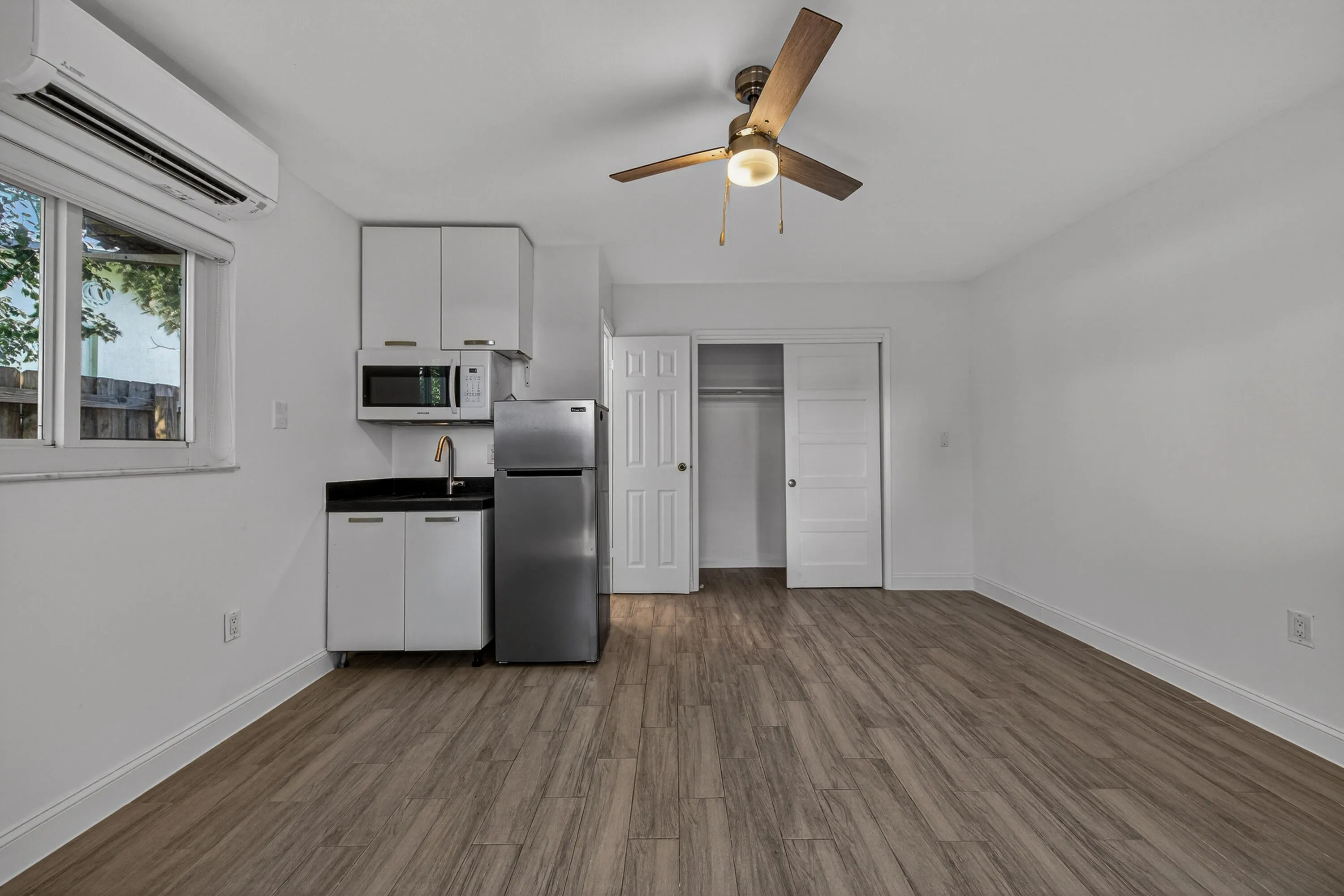 Efficiency with separate entrance for income potential.