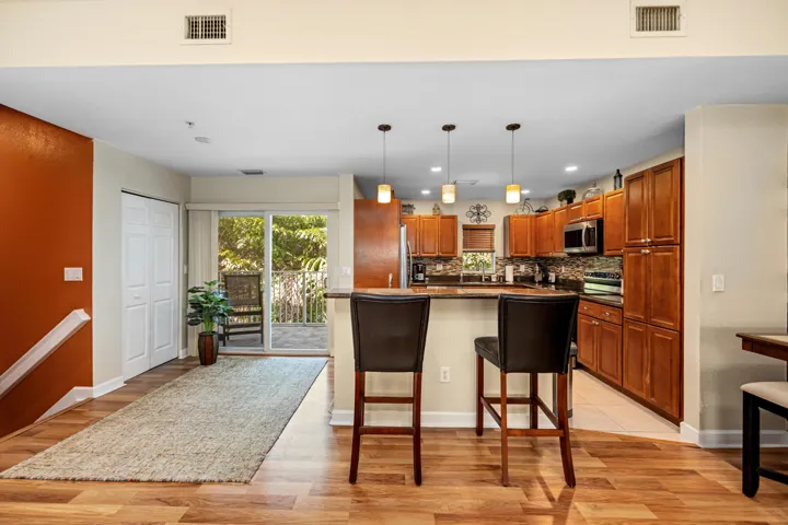 View of Kitchen and Balcony Door