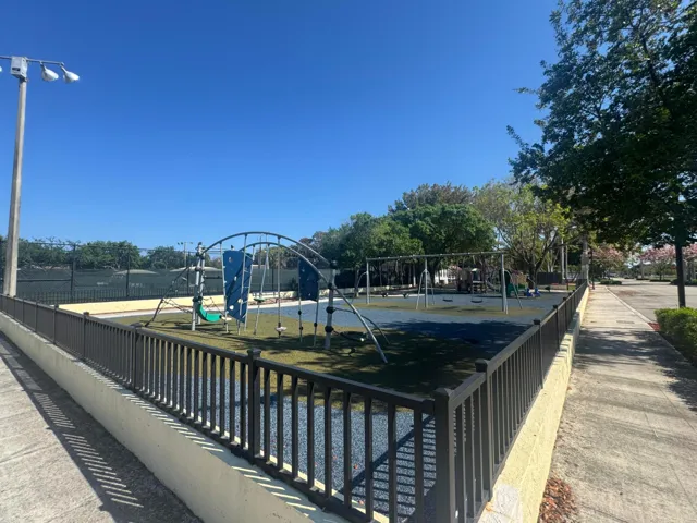 Park with Bocce, Tennis and children's play area located a short walk from home.
