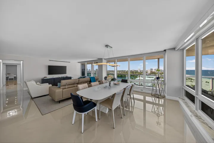 Huge Living Room / Dining room with breathtaking views of the Ocean and City.