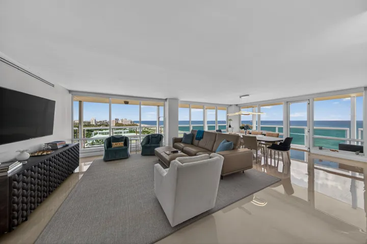 Huge Living Room / Dining room with breathtaking views of the Ocean and City.