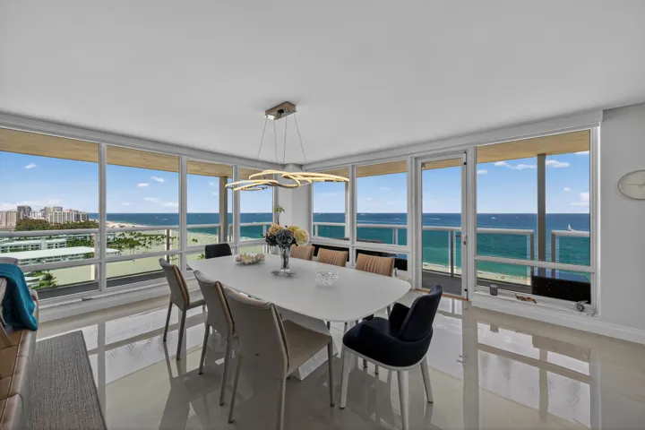 Huge Living Room / Dining room with breathtaking views of the Ocean and City.