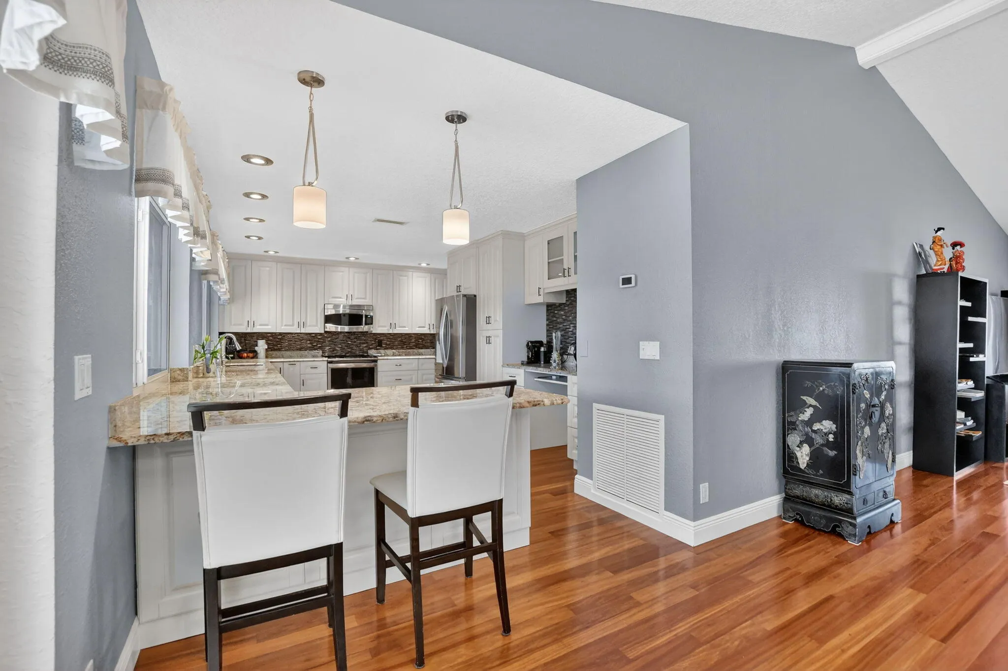Open to dining area and living room