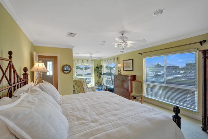 Master suite offers great views looking down the canal
