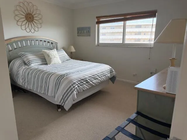 Guest bedroom can be bright or darkened with shade