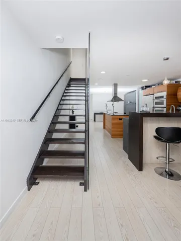 Stairs to the second level of the unit.