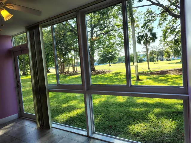 Breathtaking Views Of The Golf Course From The Sun Room With All Impact Hurricane Windows