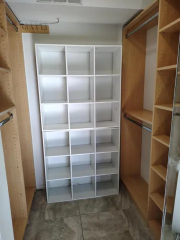 Bedroom Walk-in Closet With Built In Cabinets