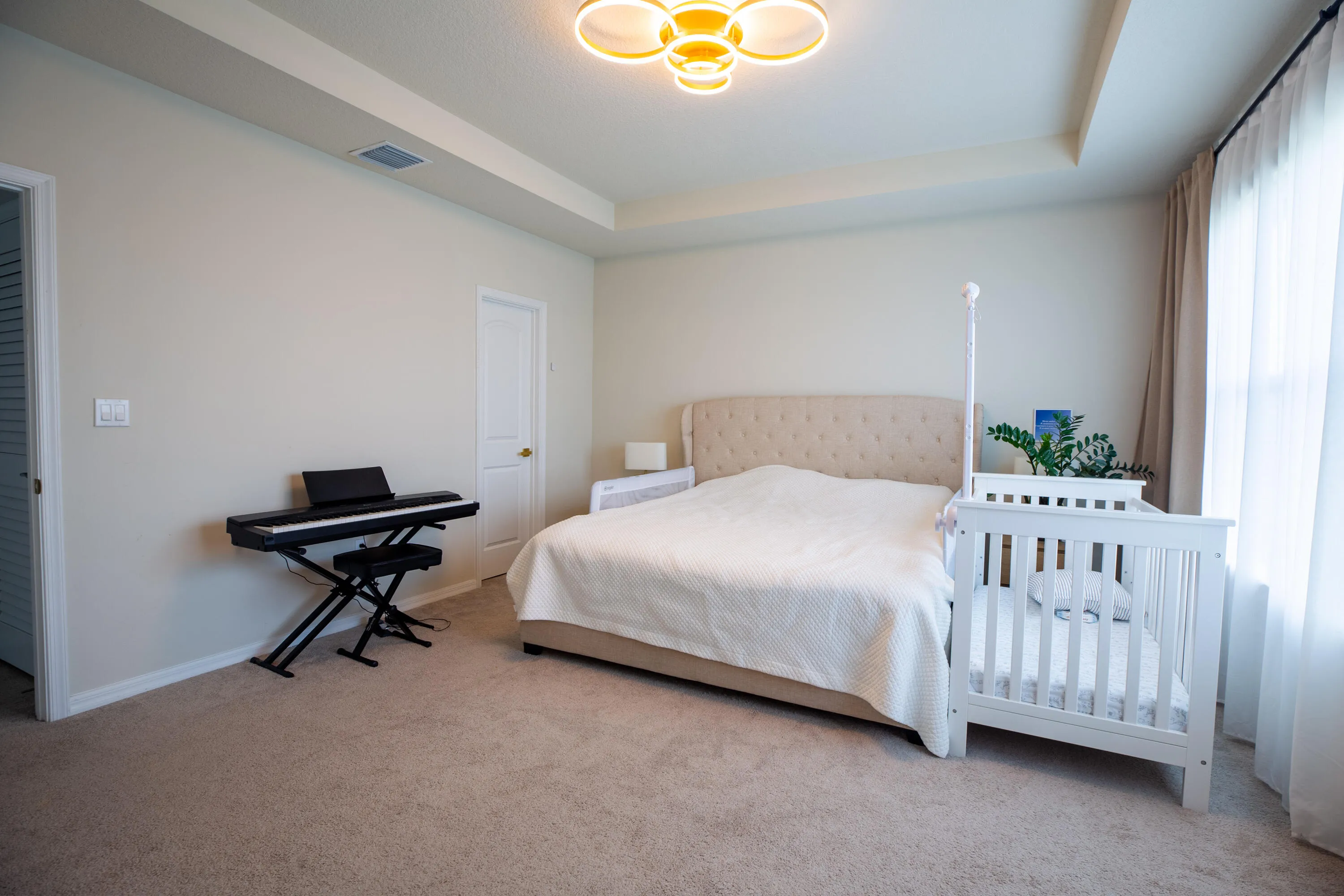 Primary bedroom with two walk-in closets
