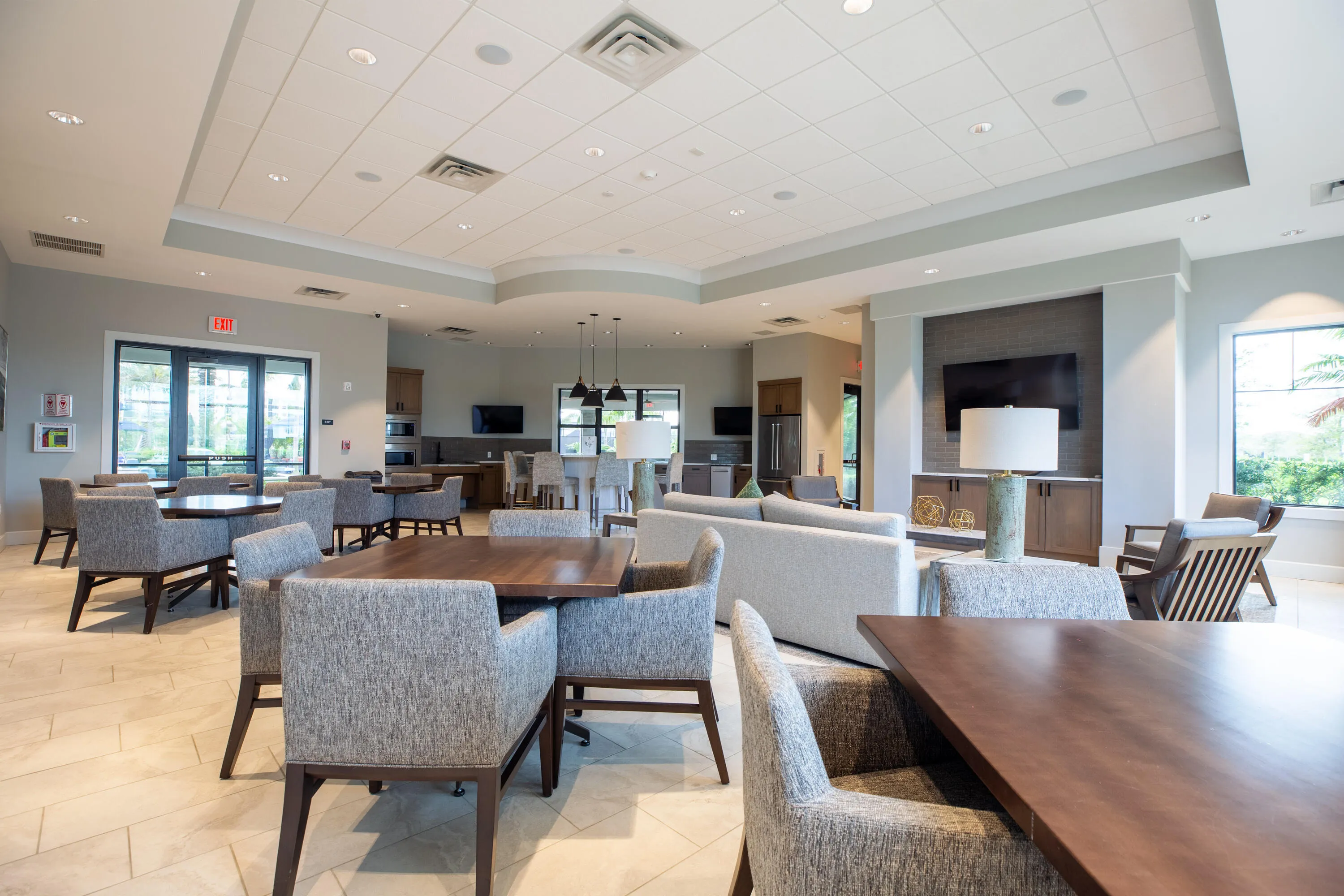 Clubhouse featuring kitchen, lounge area, and entertainment space
